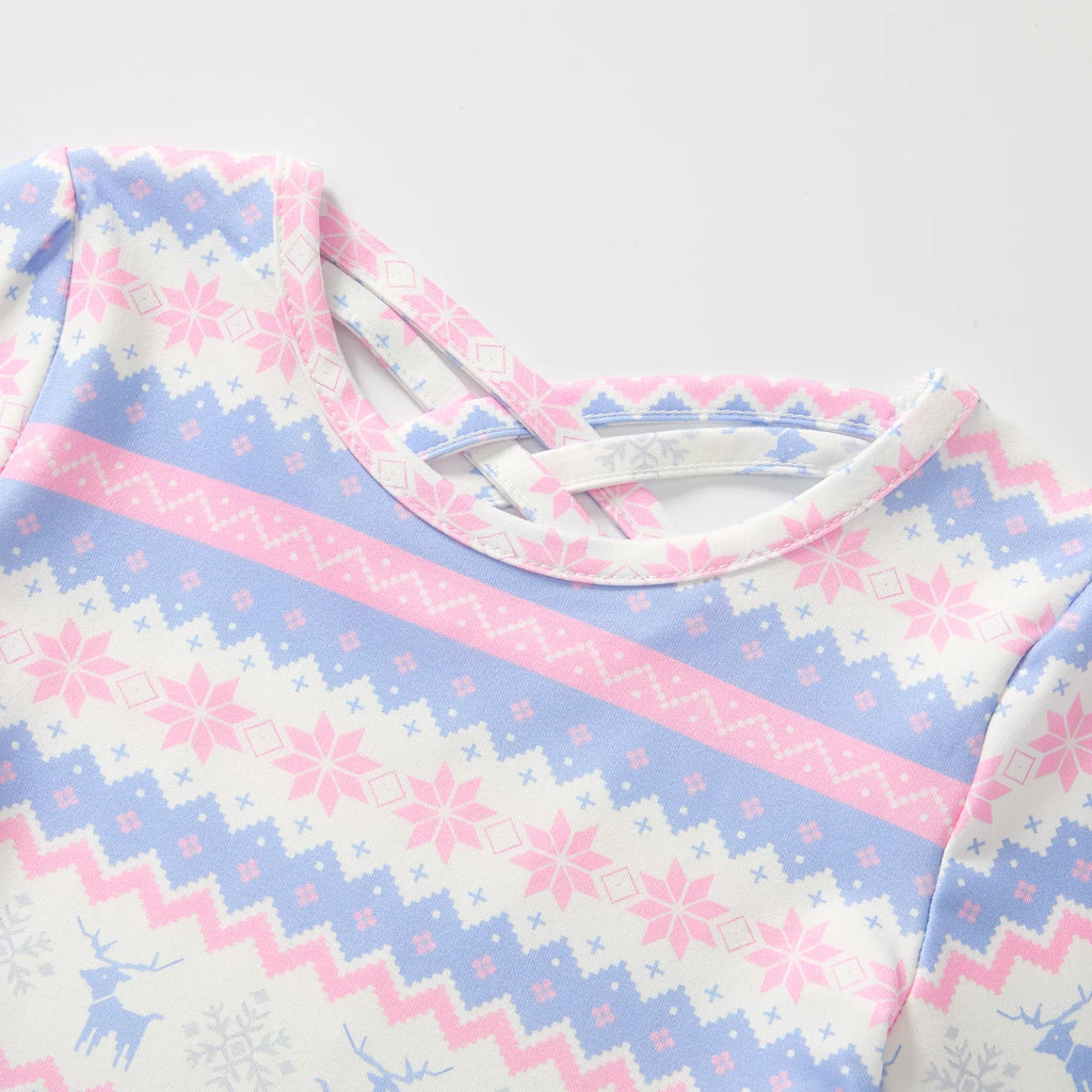 Girl dress with a festive winter pattern featuring pink and blue flowers and reindeer detailing.