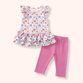 Toddler capri outfit featuring a floral top with ruffles and pink capri-length bottoms for active playtime.