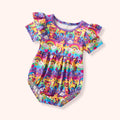 Girls' colorful animal romper featuring a vibrant pattern with animals, rainbows, and hearts, perfect for everyday adventures.