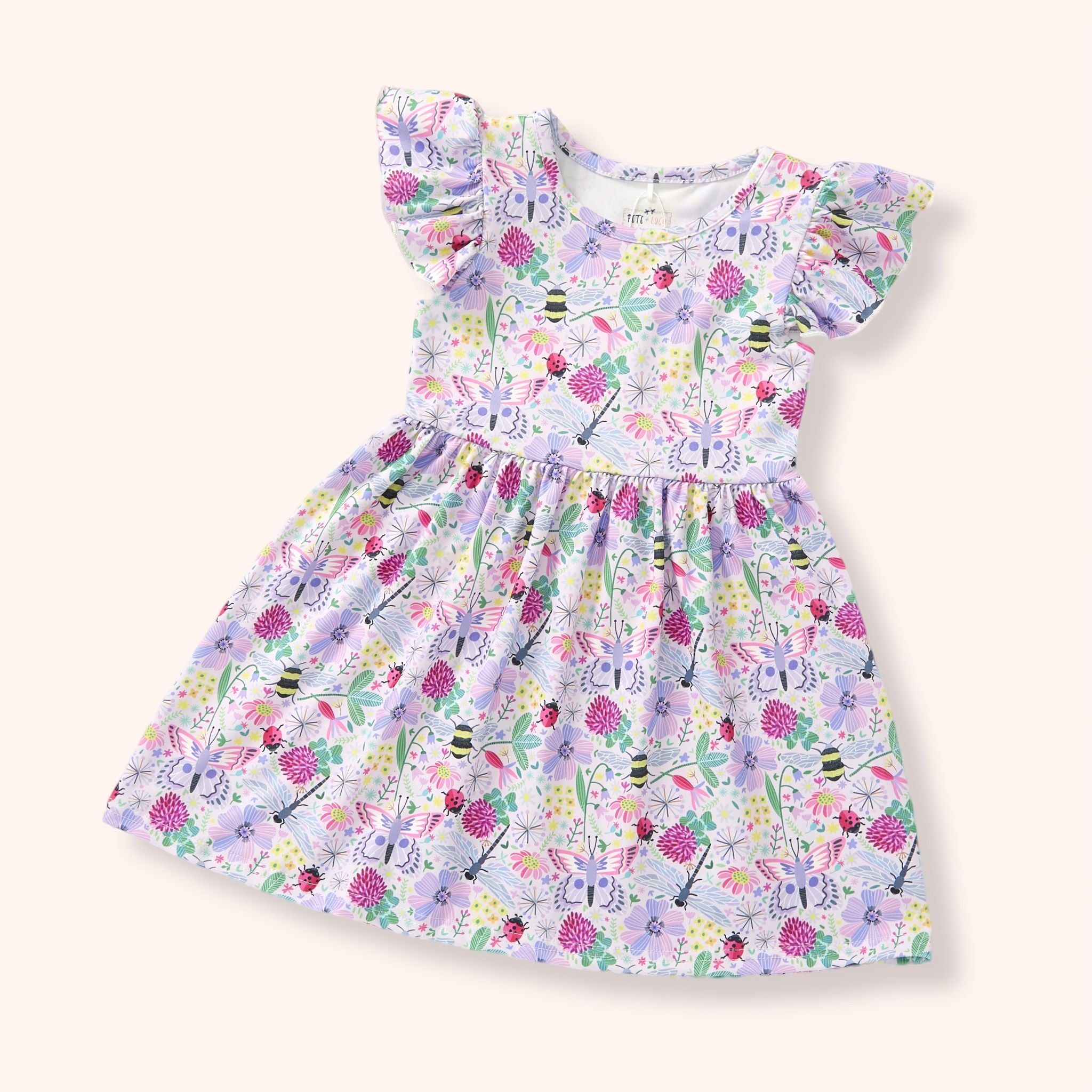 Lightweight summer girl dress with floral print and ruffle sleeves, perfect for playful sunny days.